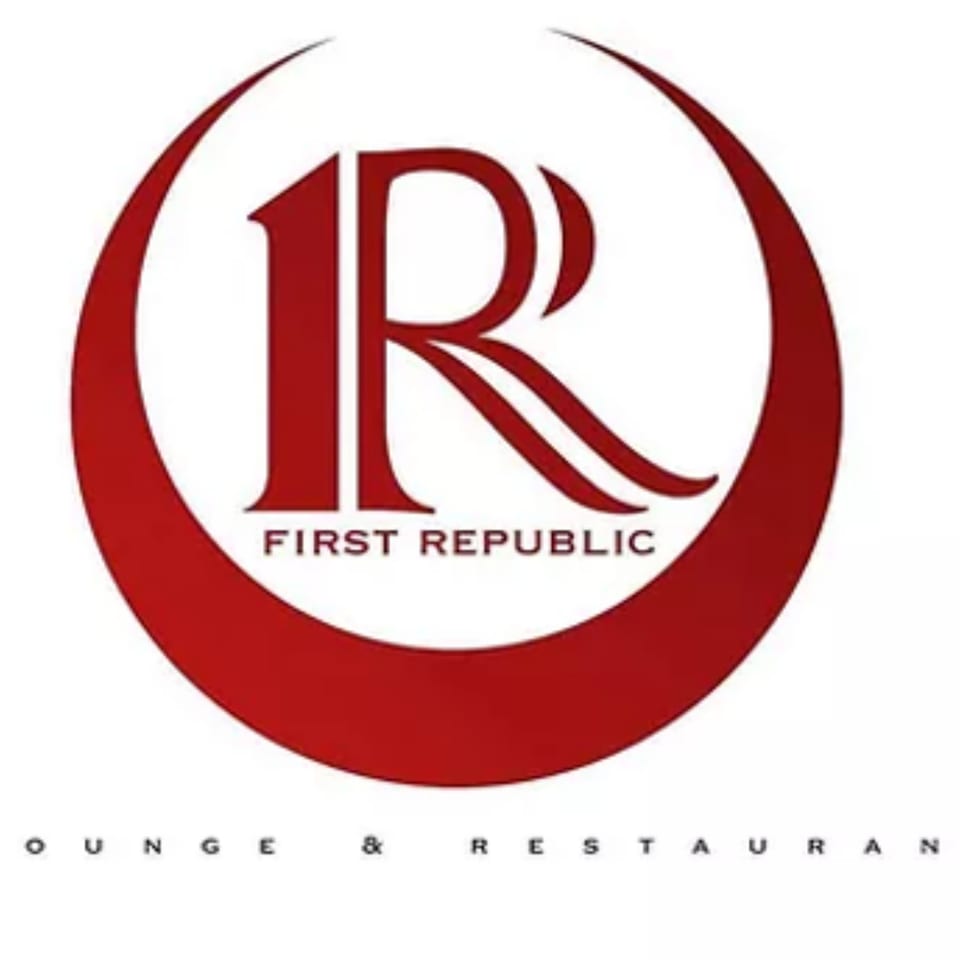 REBEL restaurant logo with a red 'R' and '1' inside a red crescent, on a white background.